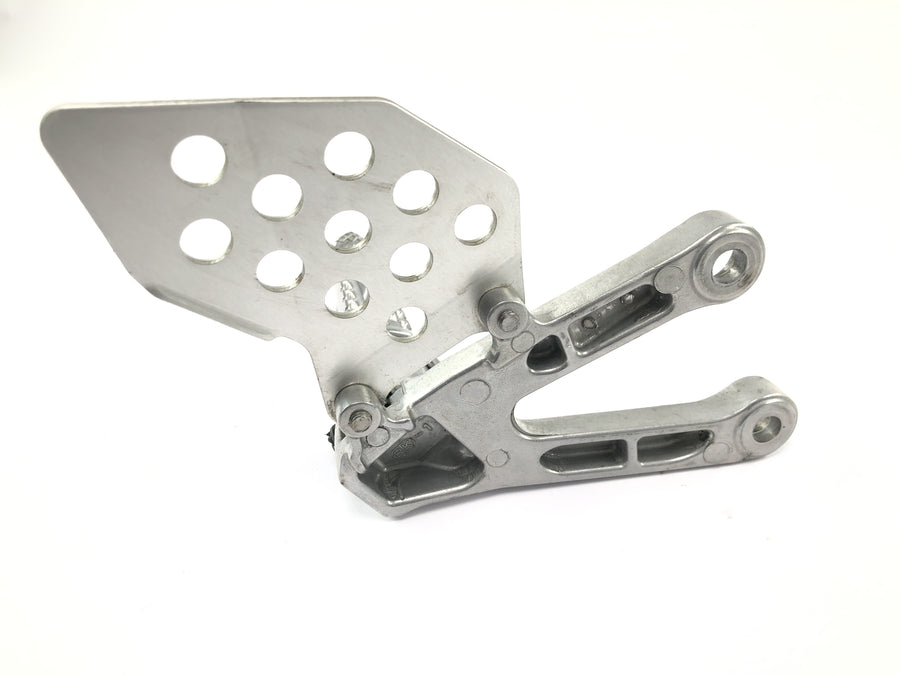 Honda CBR 600 RR PC37 [2004] - Sistema de apoio para os pés dianteiro esquerdo