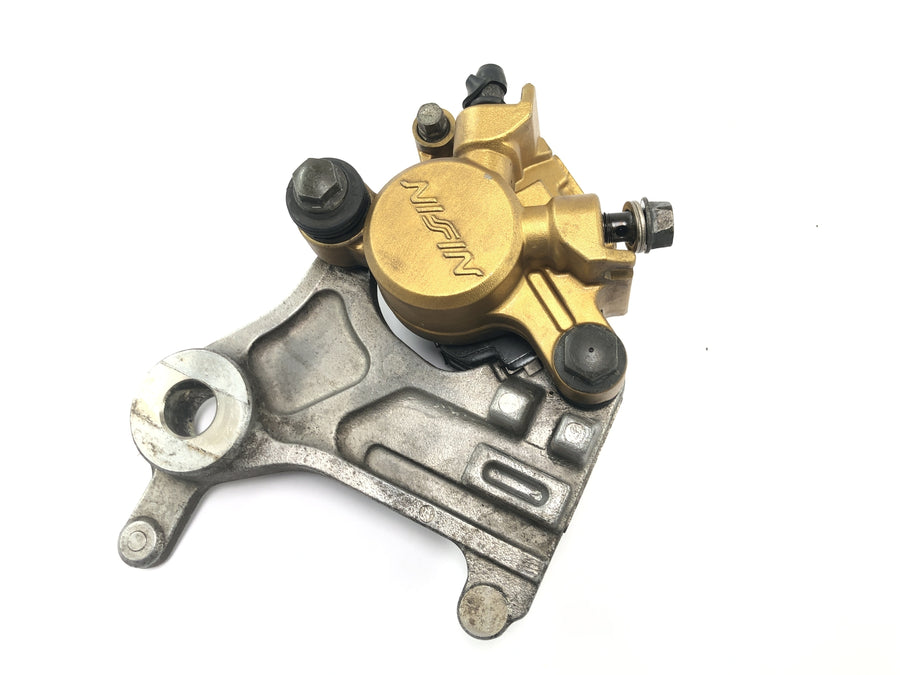 Honda FMX 650 RD12 [2006] - Pinça de freio traseiro Nissin com placa suporte