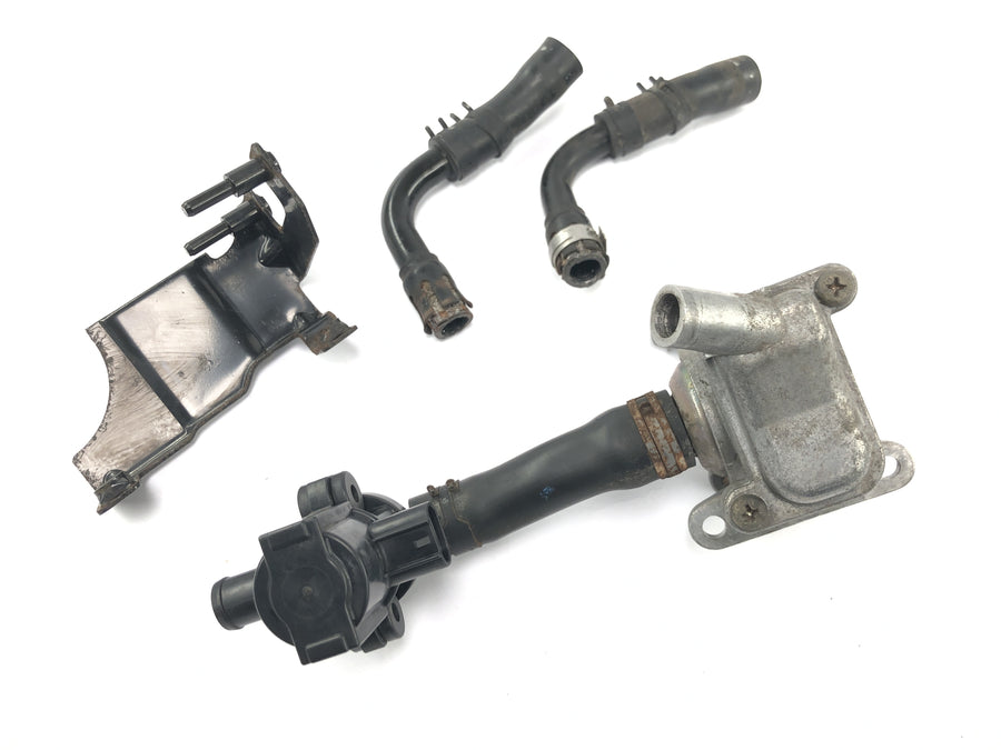Triumph Bonneville T100 986MF [2012] - Sistema de ar secundário com válvula de ar secundário