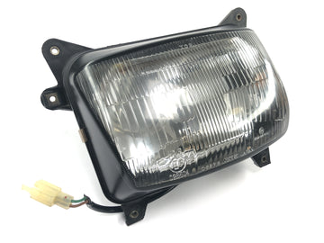 Honda NX 650 Dominator RD02 [1994] - Inserção da lâmpada do farol