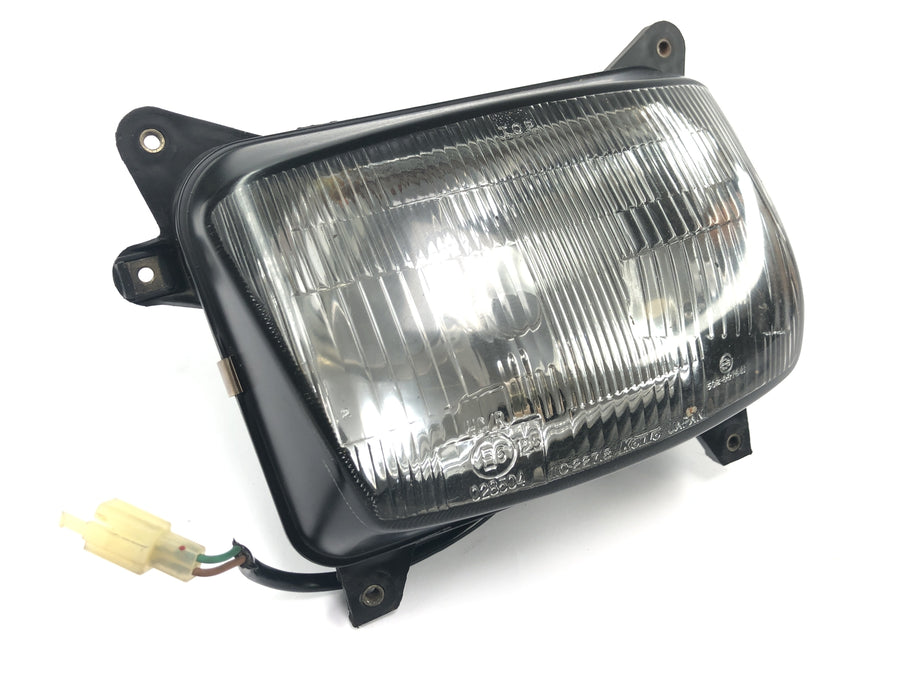Honda NX 650 Dominator RD02 [1994] - Inserção da lâmpada do farol