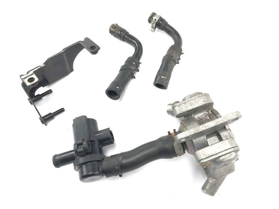 Triumph Bonneville T100 986MF [2012] - Sistema de ar secundário com válvula de ar secundário